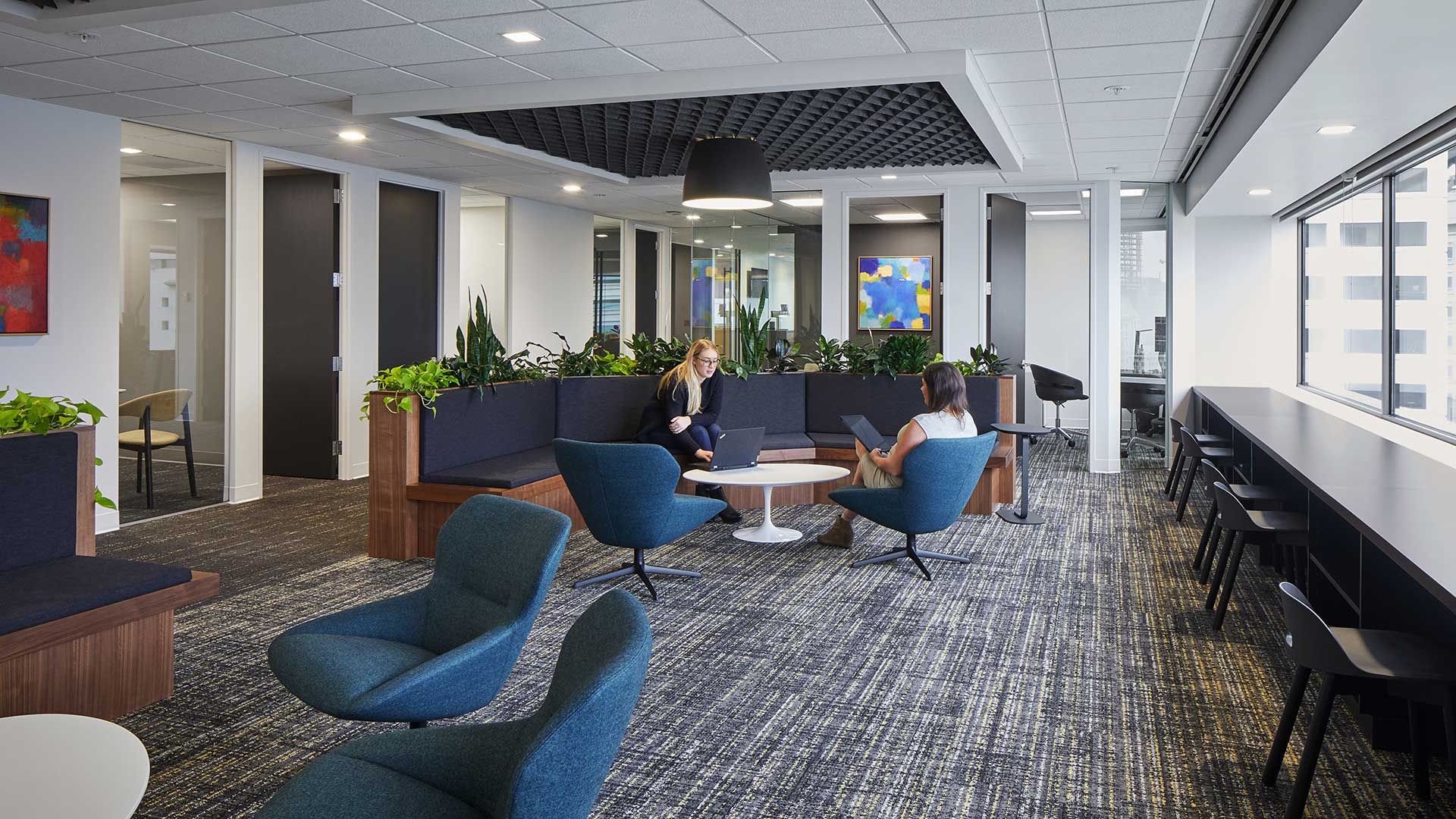 People sitting in office social area
