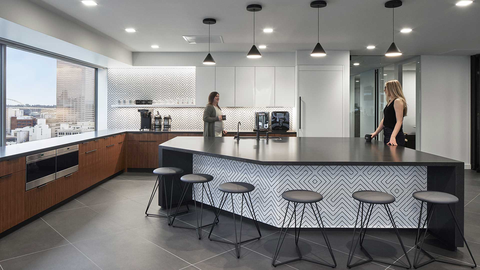 People in an office kitchen